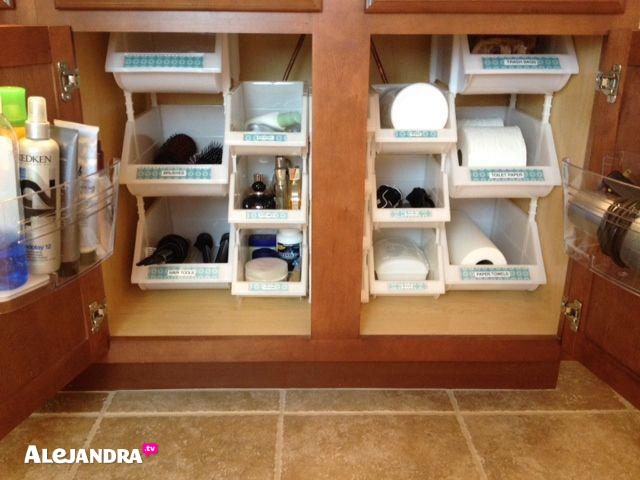 under sink roll outs maximize your cabinet space. www.helpyourshelves.com  Under  sink organization bathroom, Bathroom cabinet organization, Diy bathroom
